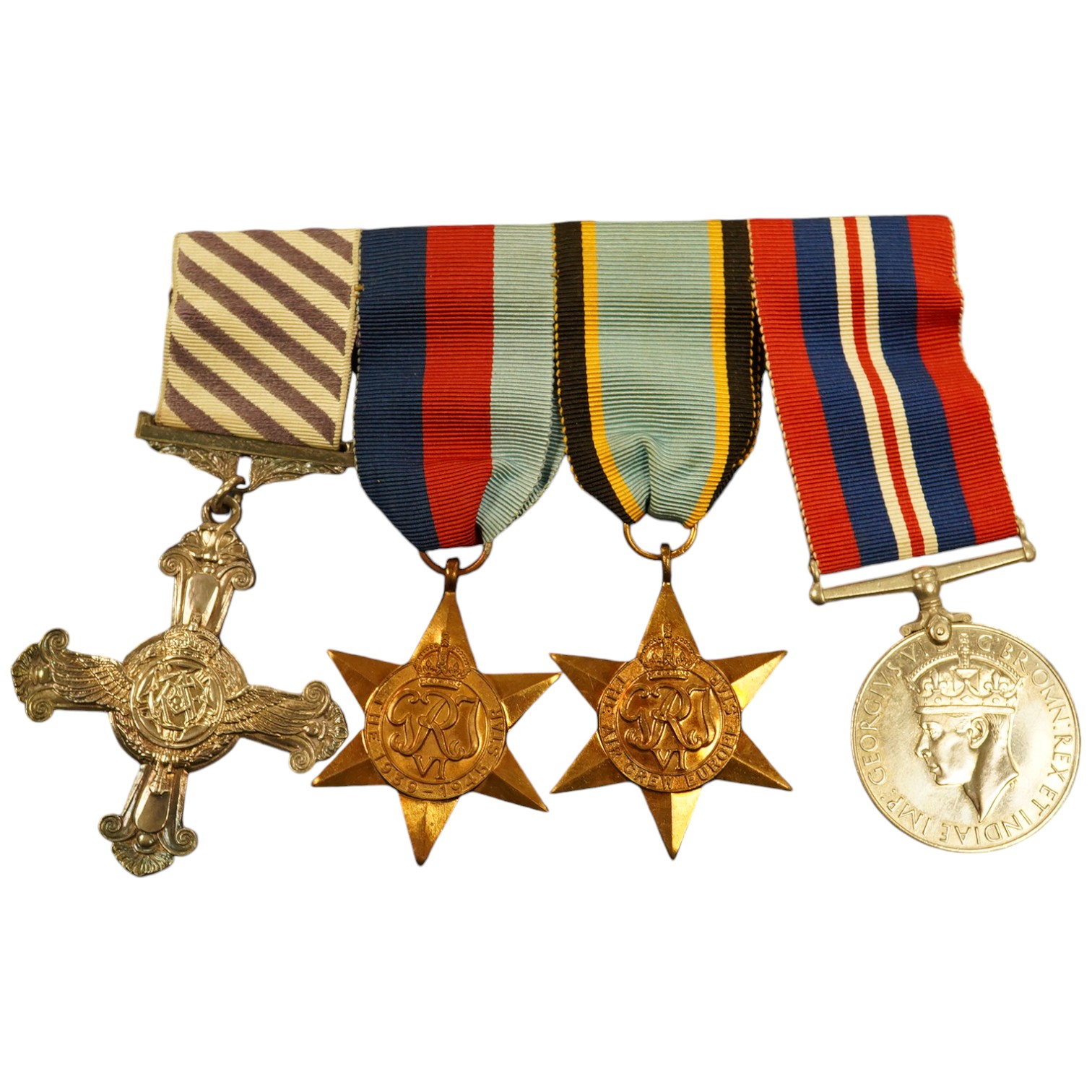 A DFC medal group with an Air Crew Europe star in a display case. Condition - good